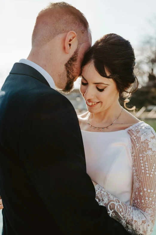 the bride and groom are emcing each other