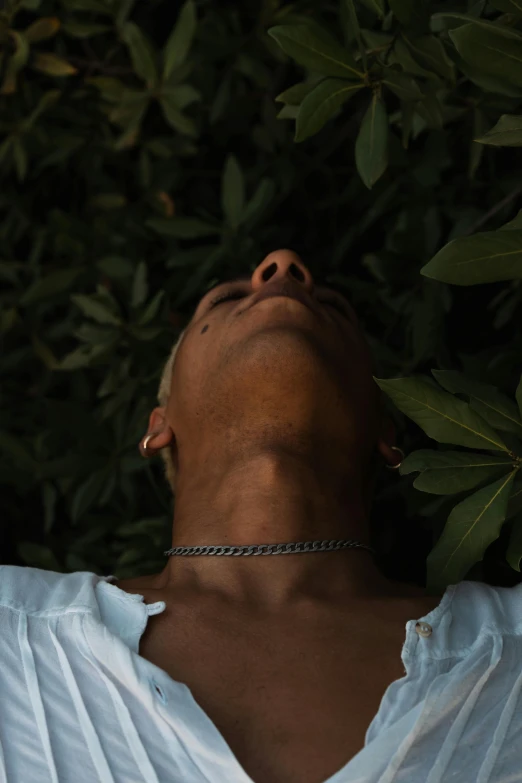 a close up of a person laying on the ground