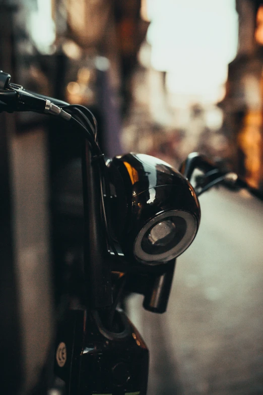 the bicycle has been left on the side of the road