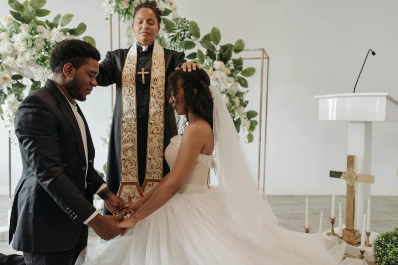 a married couple exchange vows during a wedding ceremony