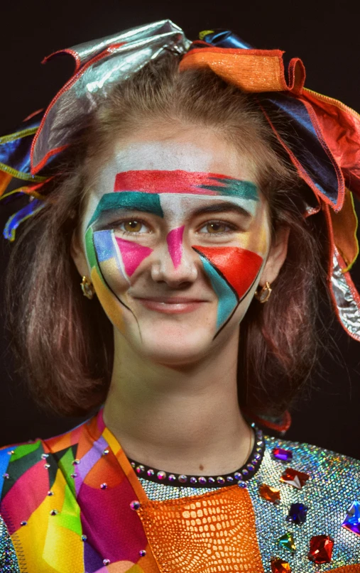 a woman with makeup painted on her face