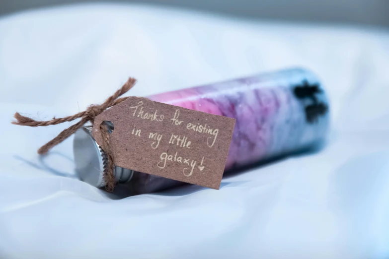 there is a purple tube with writing on it