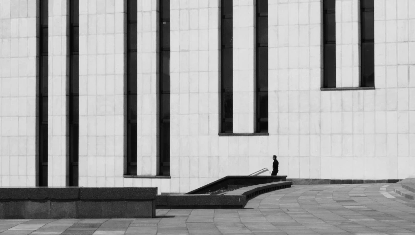 a man riding a skateboard on the side of a ramp