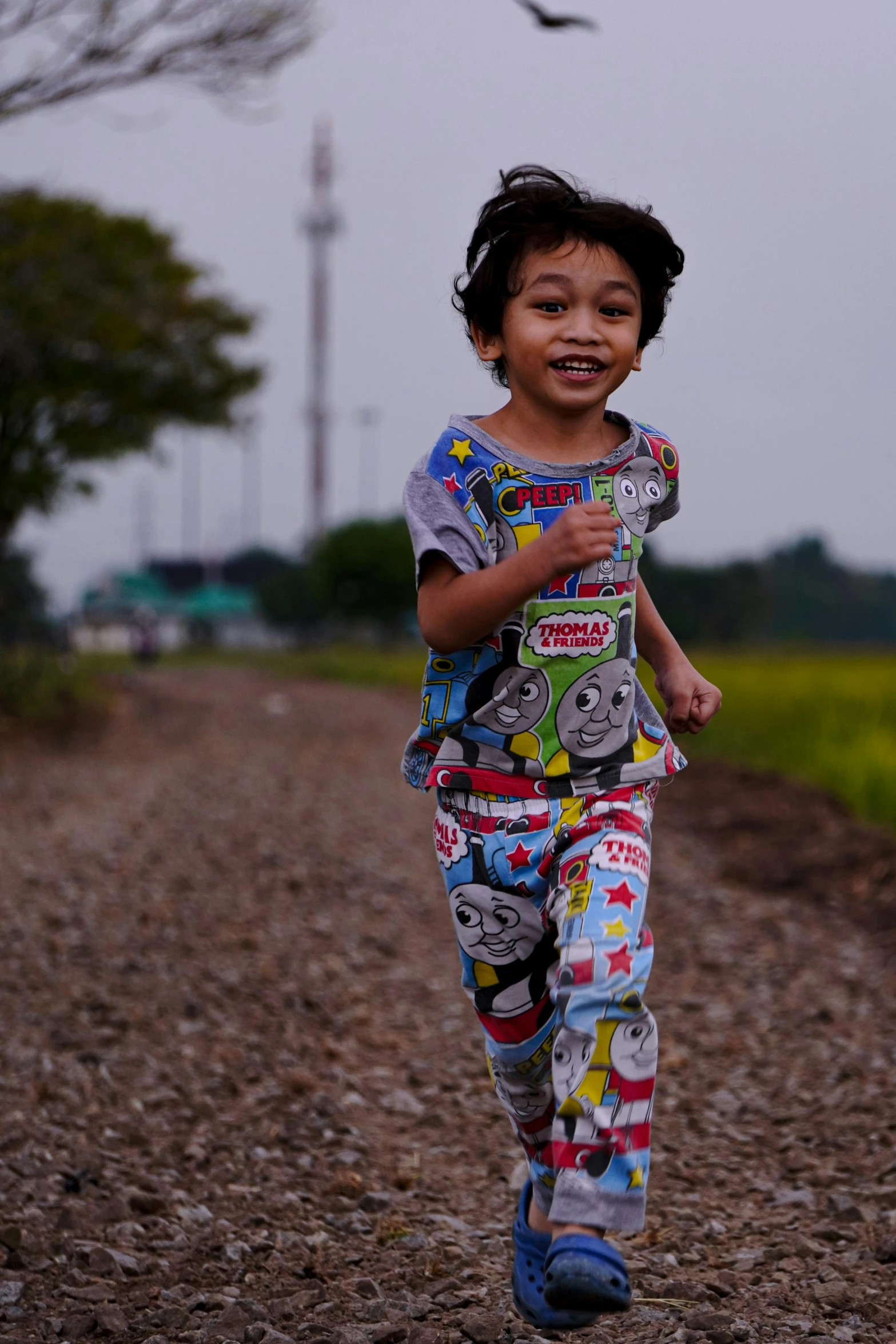 a  is running along a road