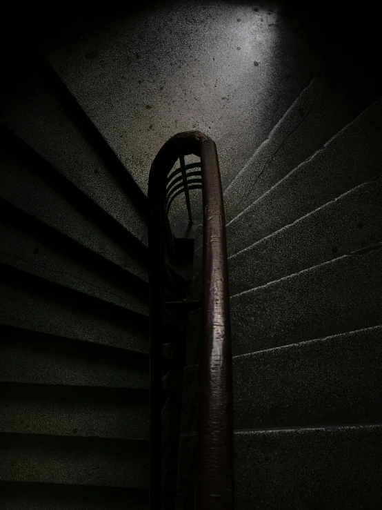 a close up view of an old fashioned air conditioner in dark