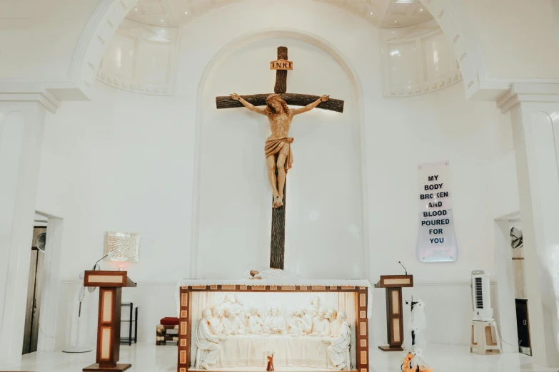 the alter of a catholic church with religious objects