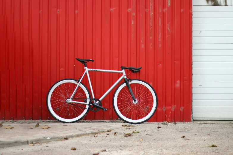 this is a bike parked on the side of a building