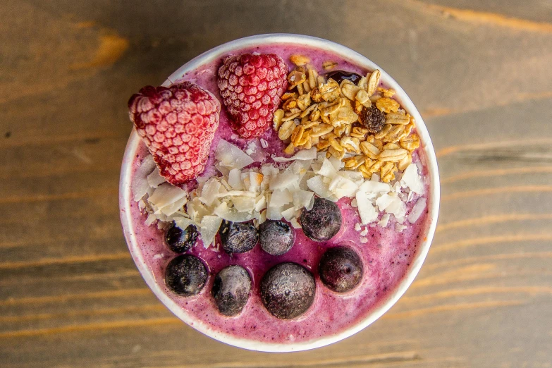 a close up of a bowl of food on a table