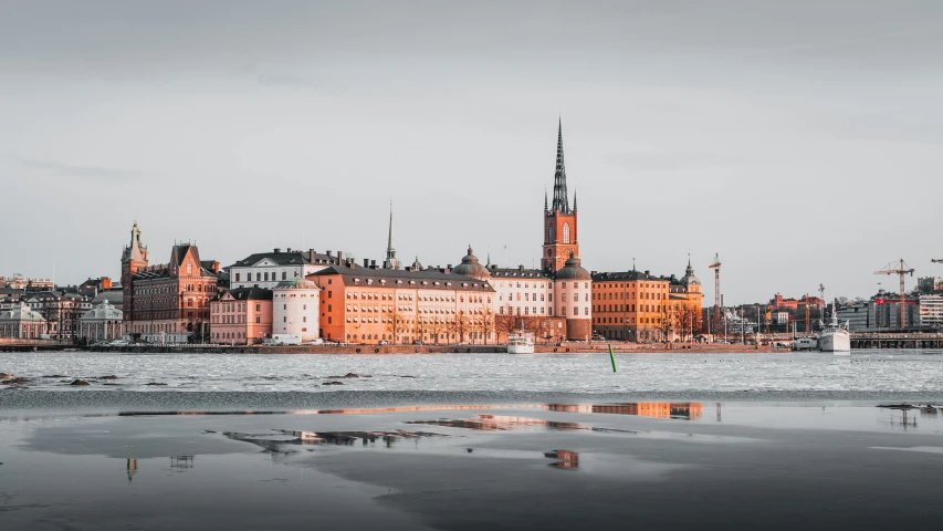 there is a view of a city that has water and sand