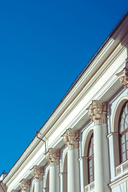 the side of a building with several columns