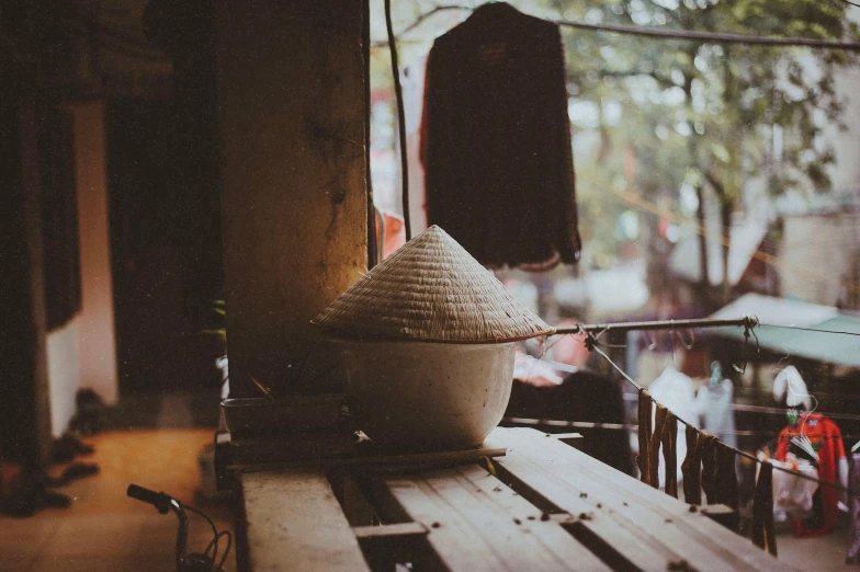 a white bowl sitting on top of a wooden table