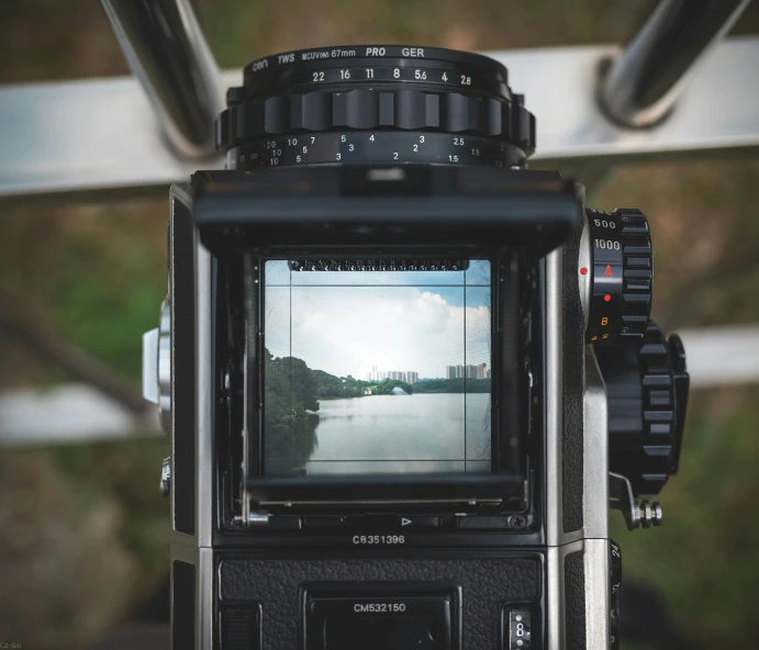 a camera with a large lens and camera attached to it