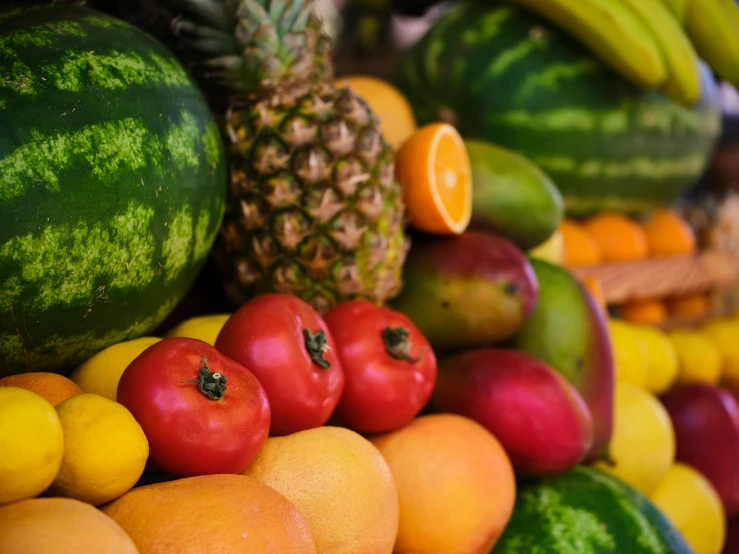 a bunch of fruit is sitting on a table