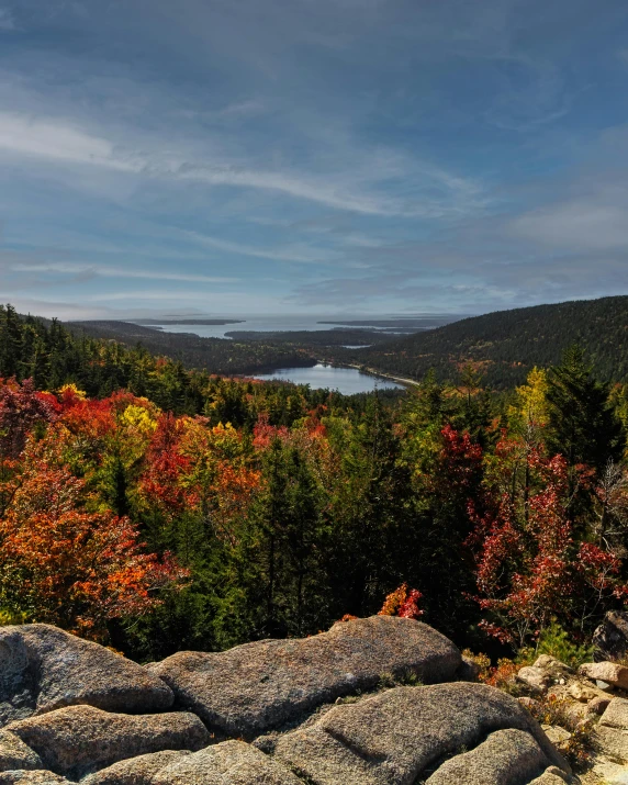 a view of the mountains and the lake from above