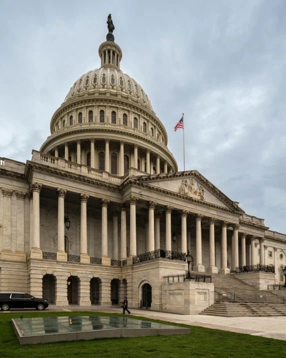 a car parked in front of the united states capitol