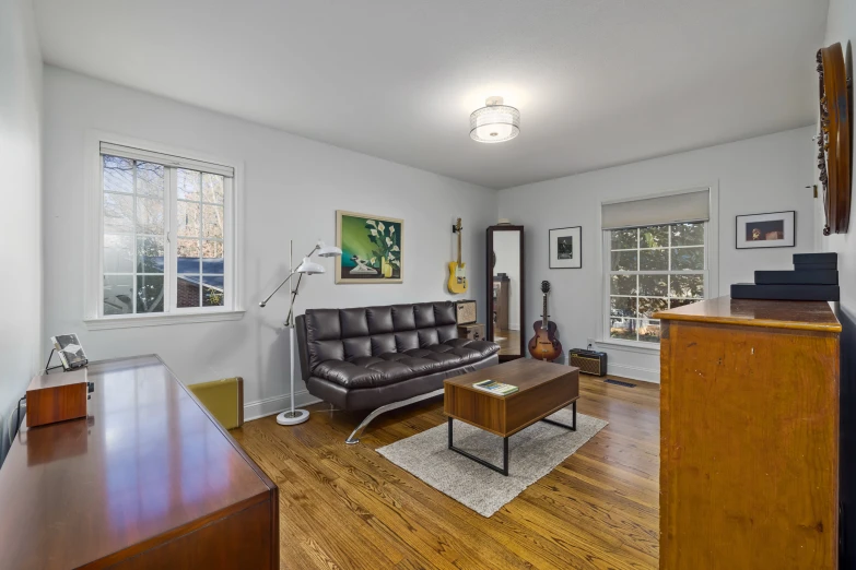 the large living room is clean and ready for people to use