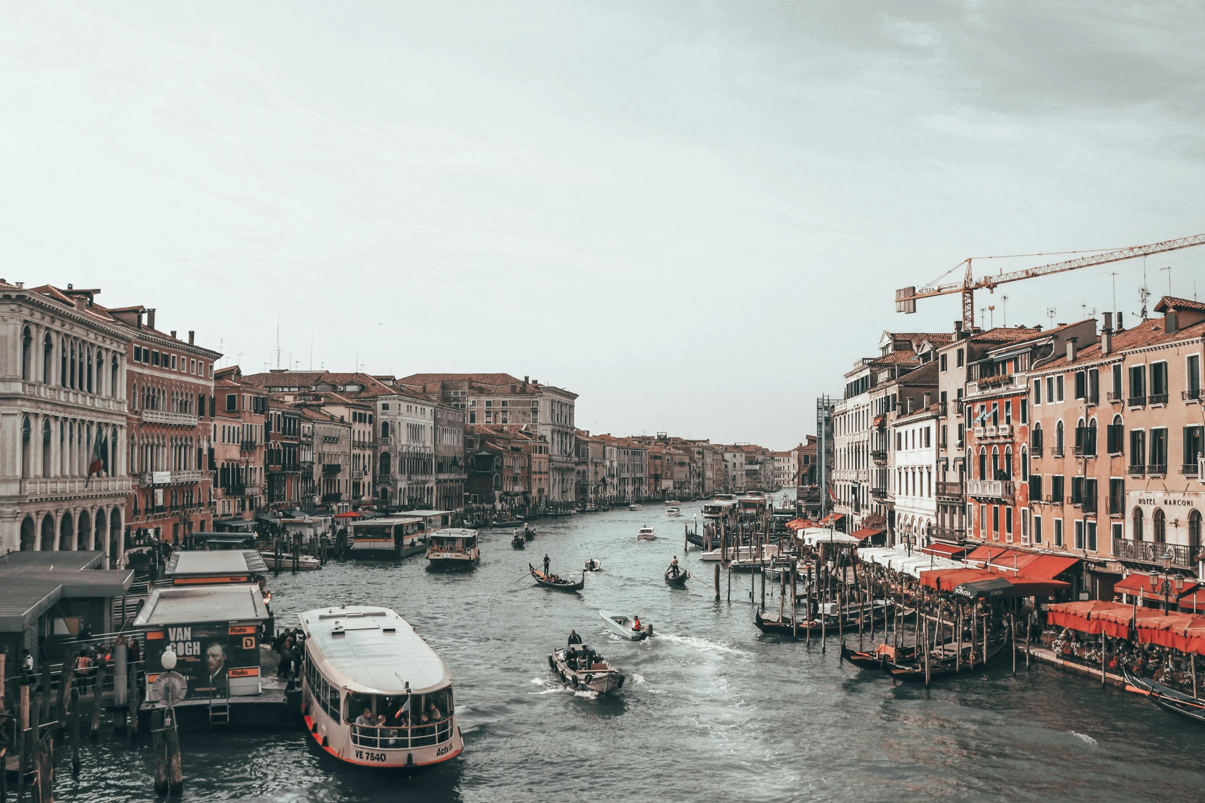 the large boat is traveling down the canal in venice