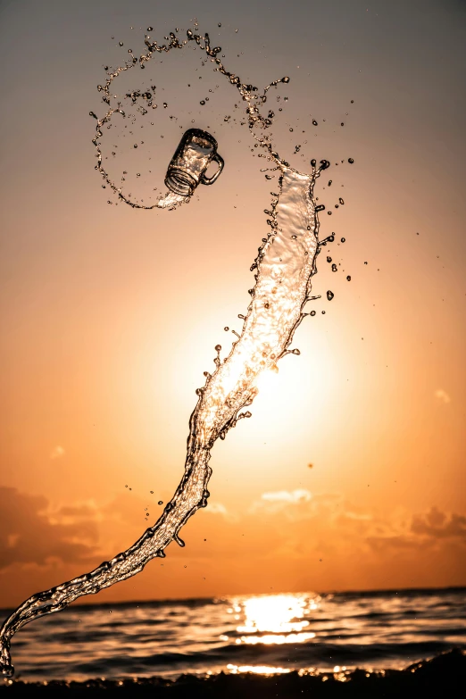 water splashing from a hose on the shore of a beach