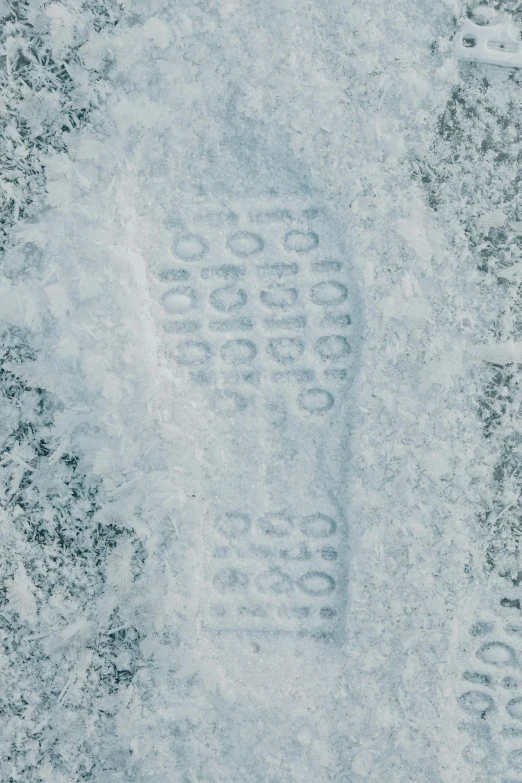 snow is covering a large sandy beach