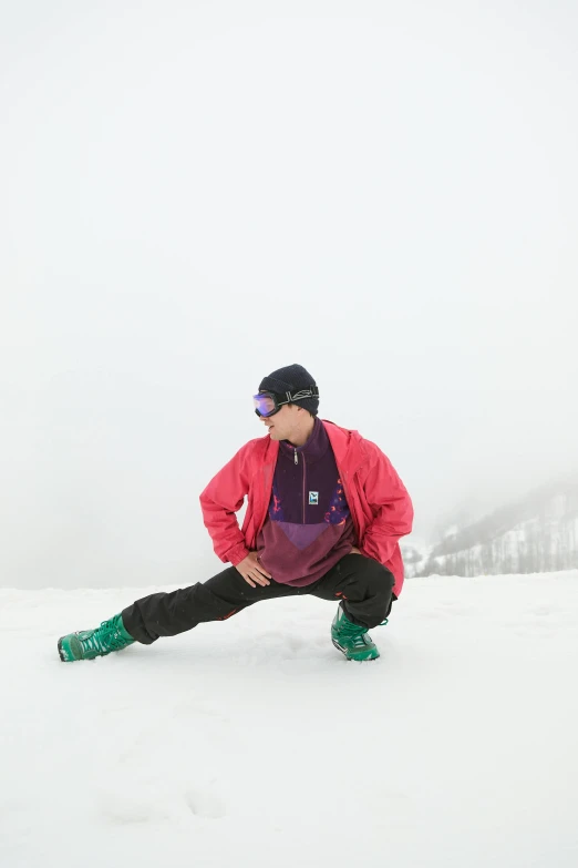 a person on a snowboard in the snow