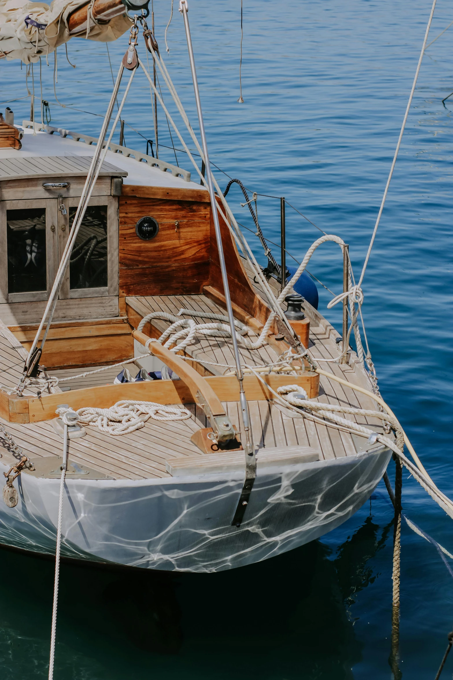 a boat docked at dock in a large body of water