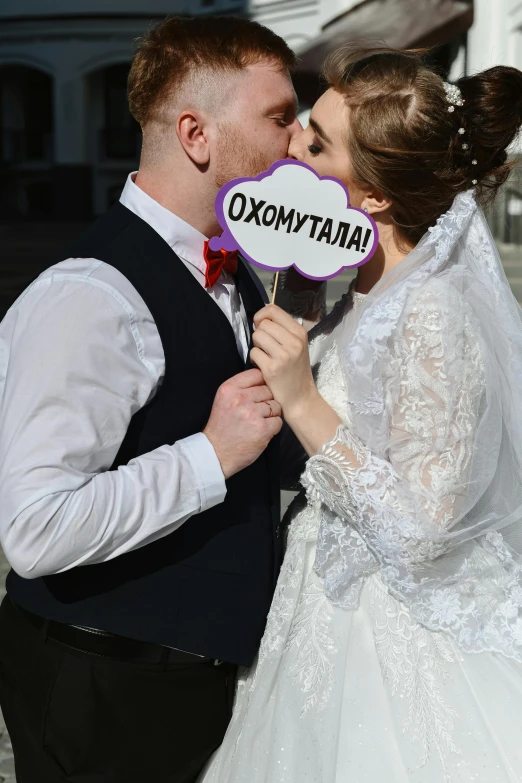 couple kissing in front of the opera union theatre