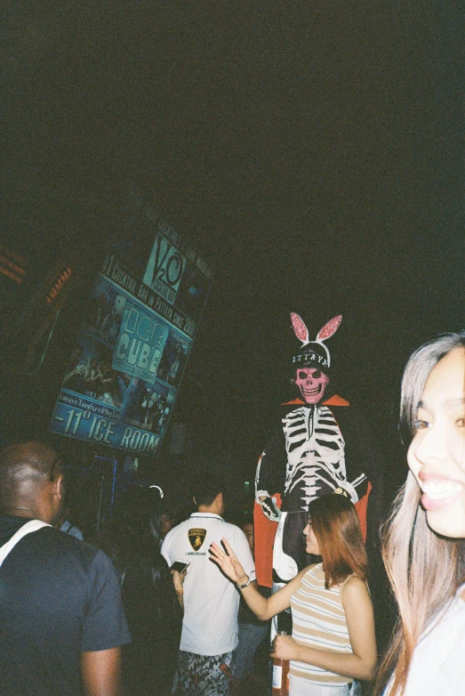 a girl with a fake bunny in the middle