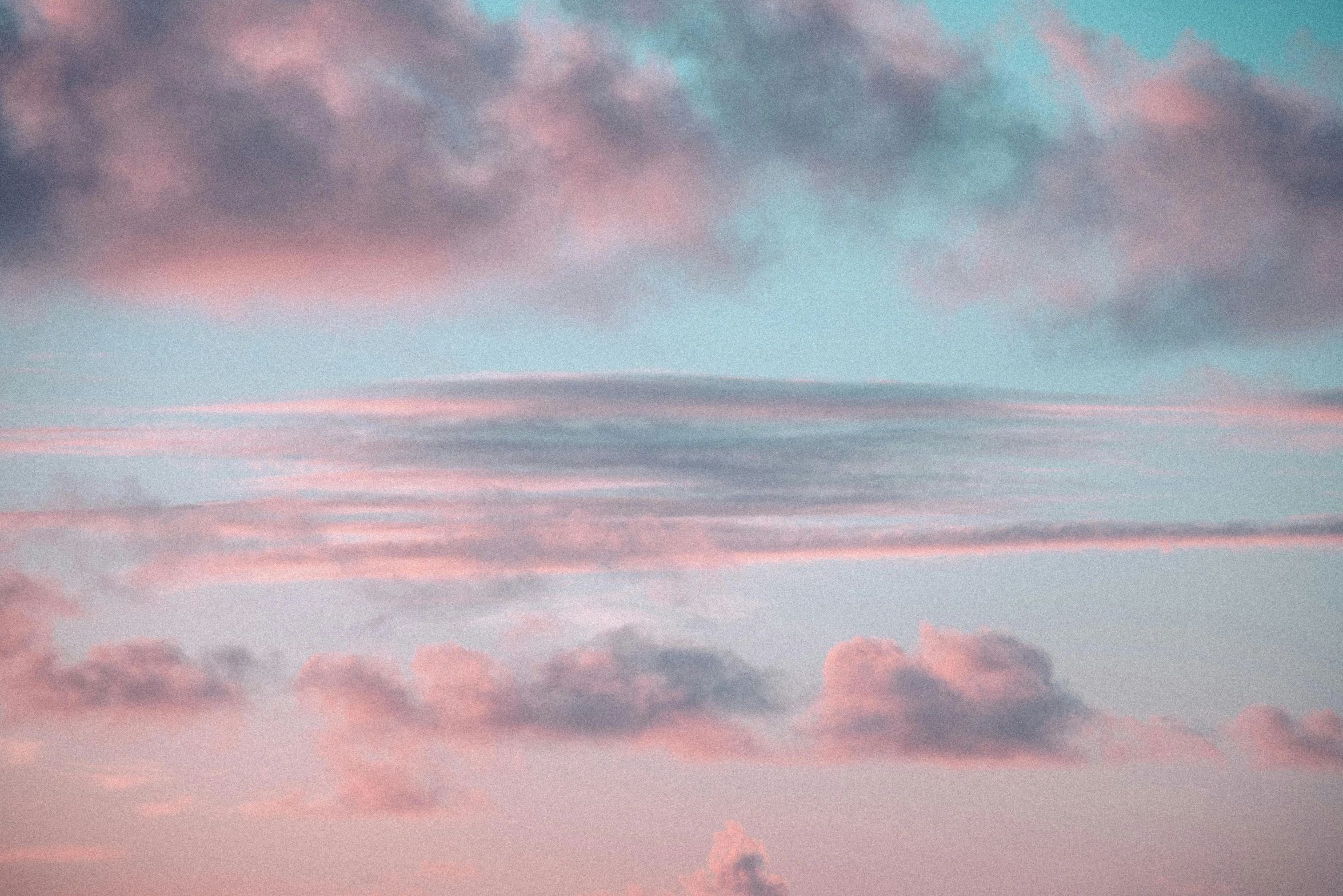 the sky above a city at sunset, with clouds moving quickly