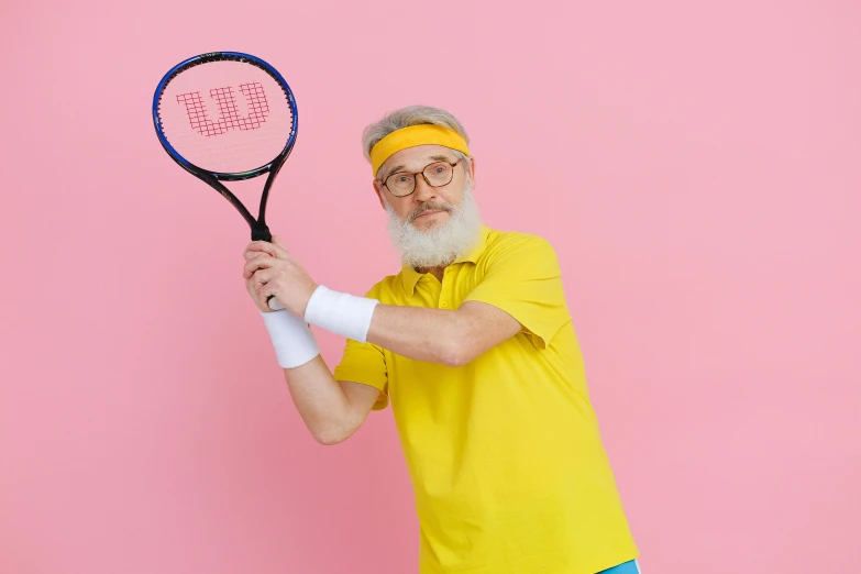 a tennis player posing for a po with a racquet