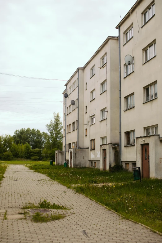 the building with the red door is very large and empty