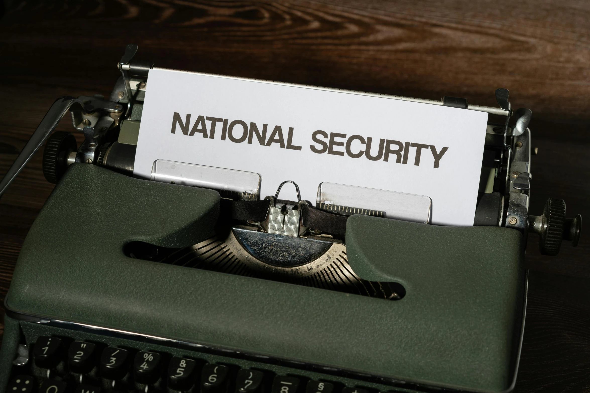 the national security paper stuck to an old typewriter