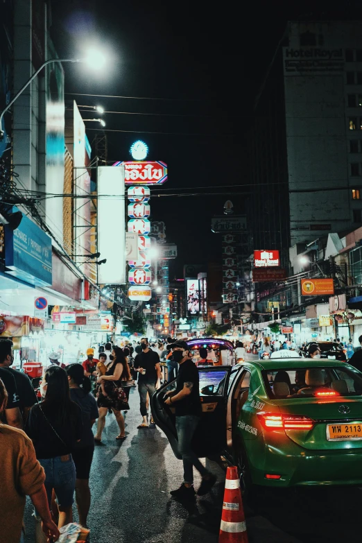 an image of people in the middle of the city