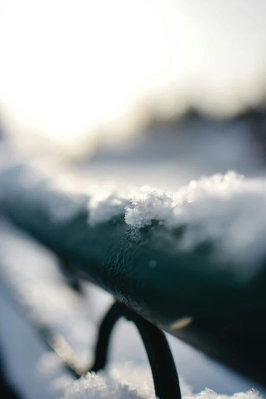 a close up of the side of a ski slope covered in snow