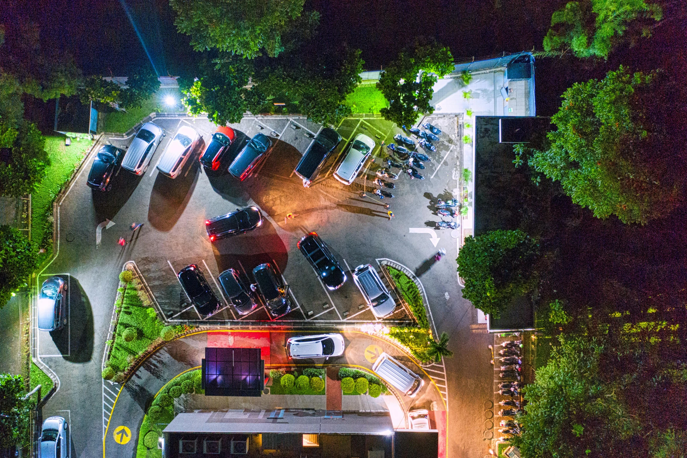 an overhead view of traffic and a parking lot