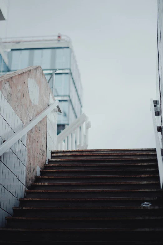 some steps to a building next to some buildings