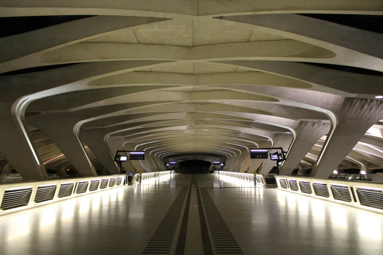 a train station with the lights on