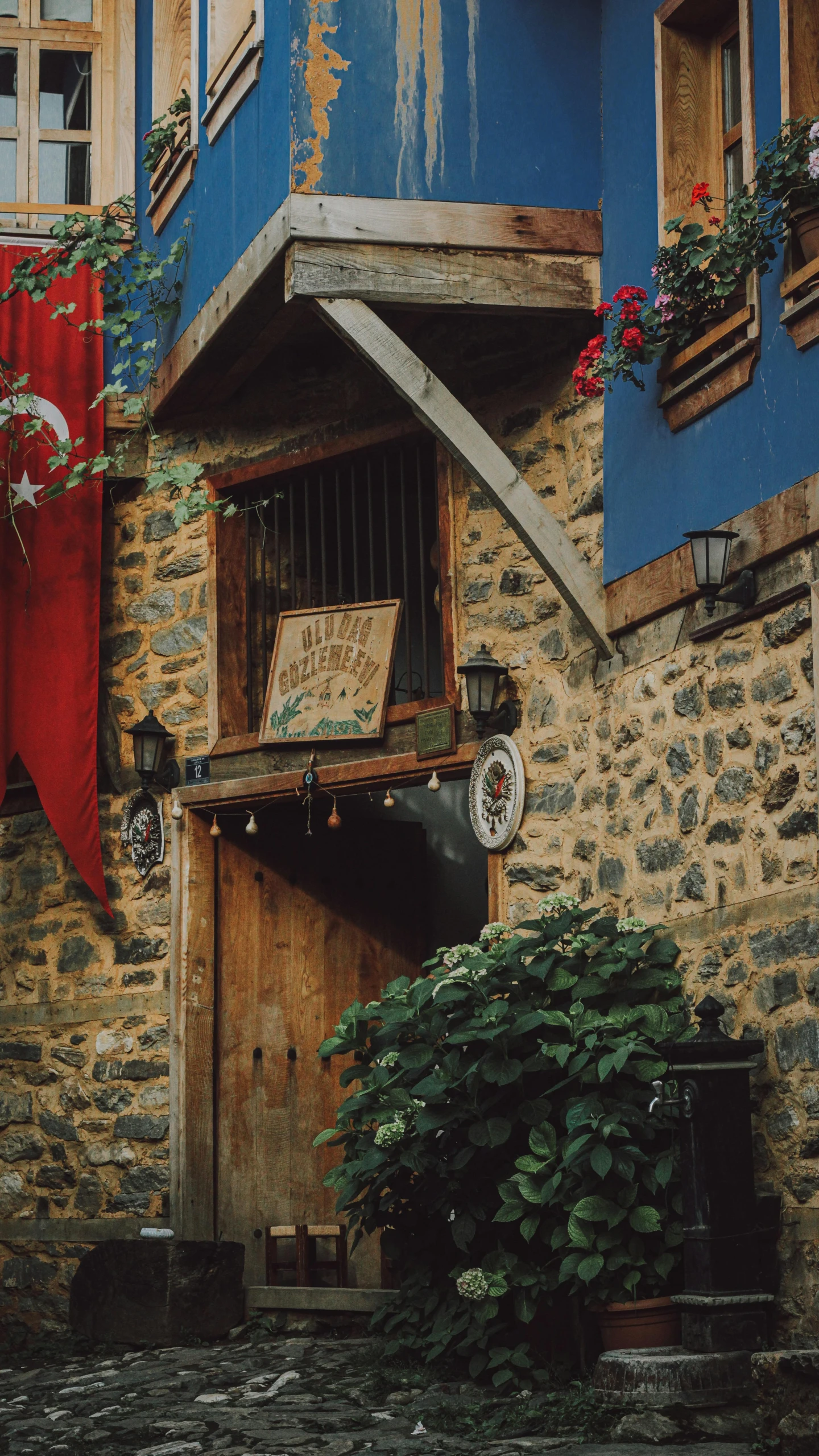 a building with stone steps in the courtyard