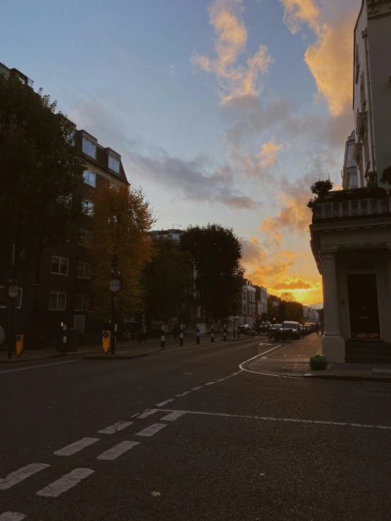 a very bright sky in the middle of a street