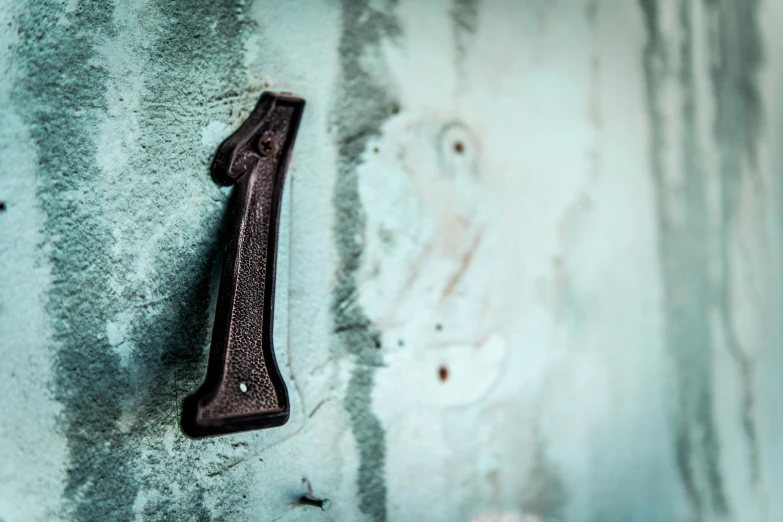 close up of a metal handle on a wall