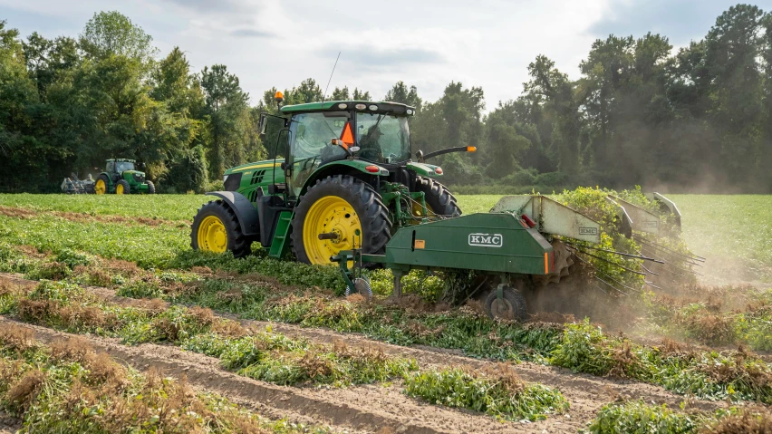 a person is being pulled behind a tractor