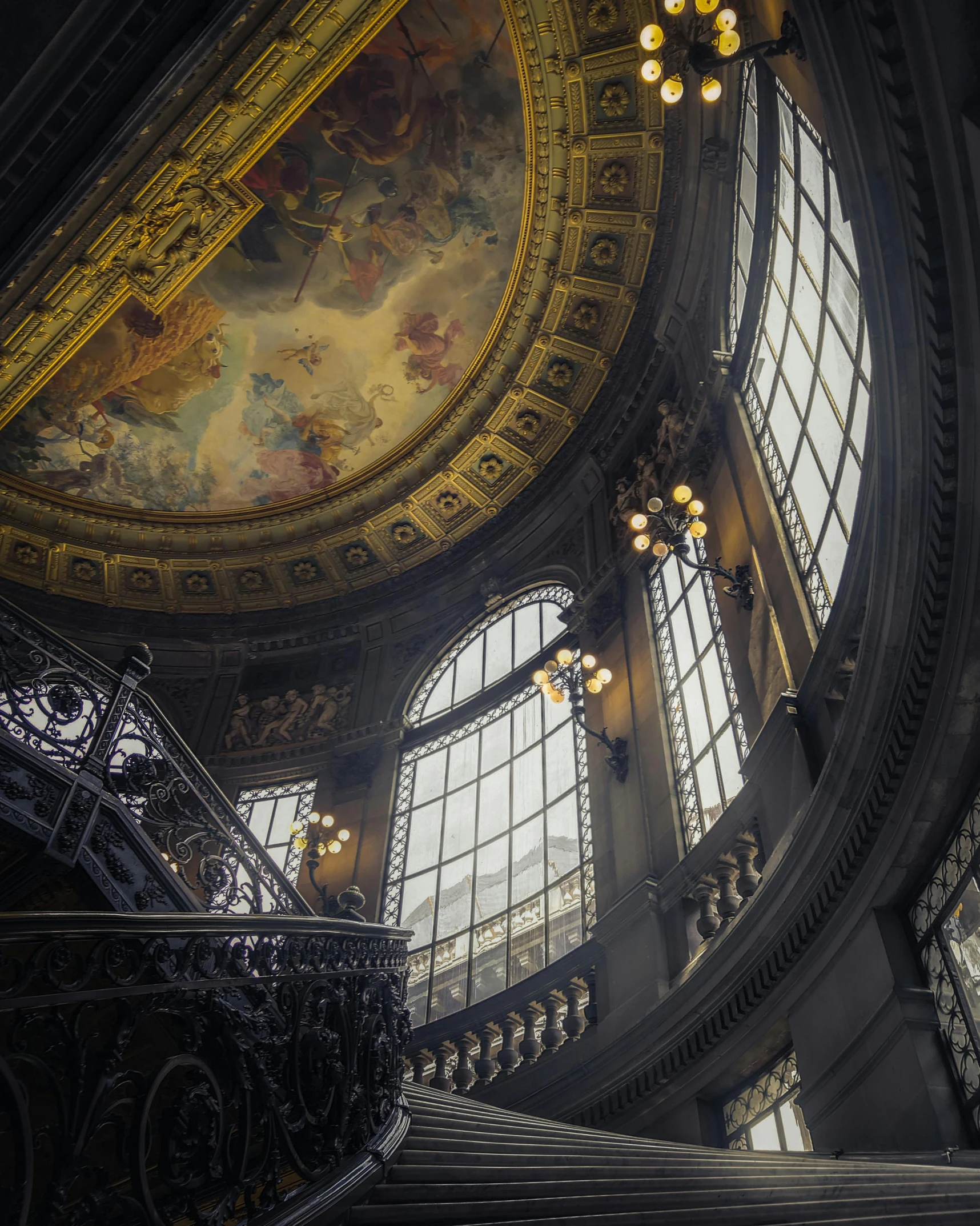 a view of the ceiling and windows on top of a building