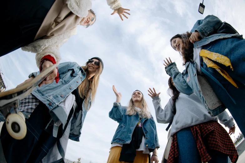 there are several women standing in a circle