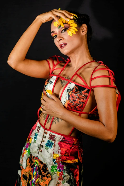 a young woman is posing for the camera wearing colorful clothing