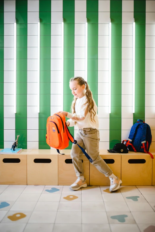 the girl is walking through an empty building