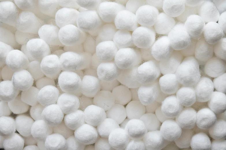 a close up s of several white balls