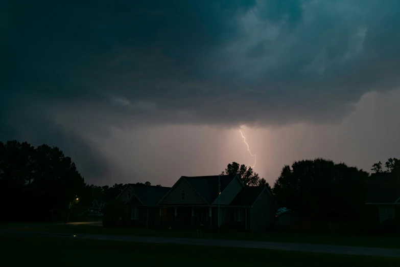 a large storm is coming from a house