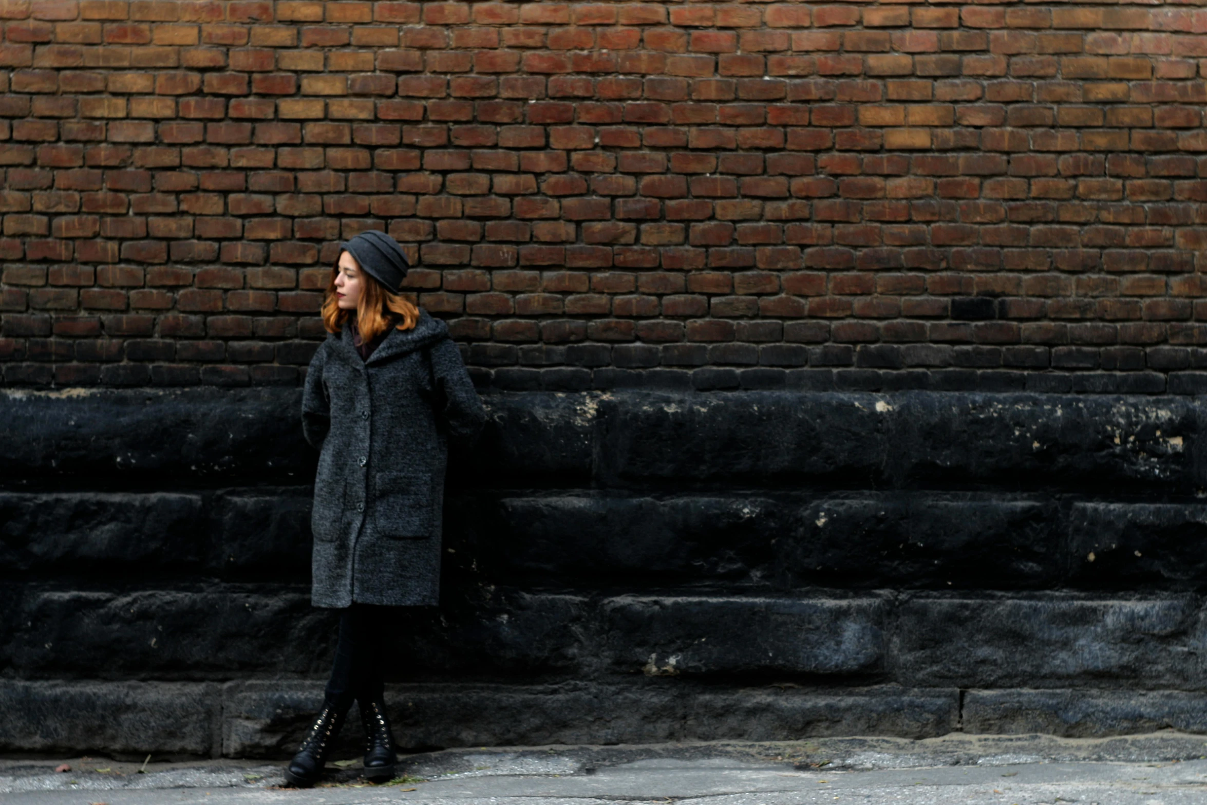 a beautiful woman standing next to some steps