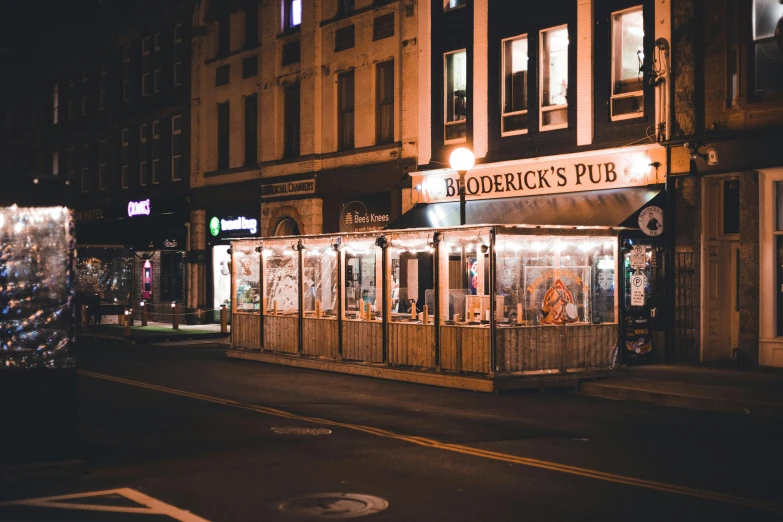 a store that has lots of windows and lights