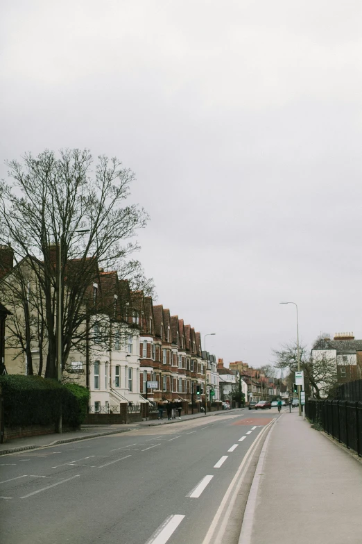 a street that has several buildings lined along it