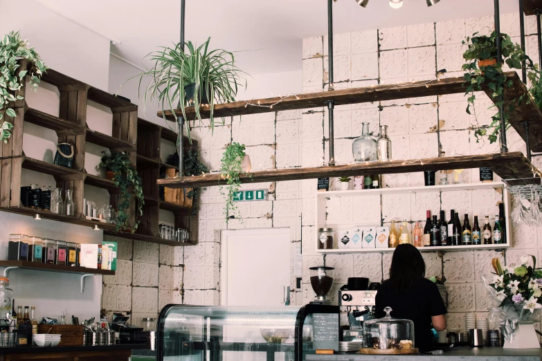 a woman making an order in a cafe